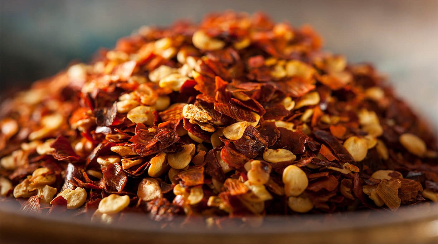 chilli flakes in pile on table