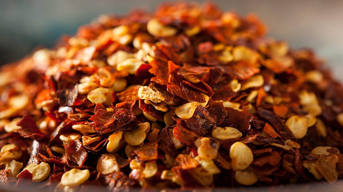 chilli flakes in pile on table